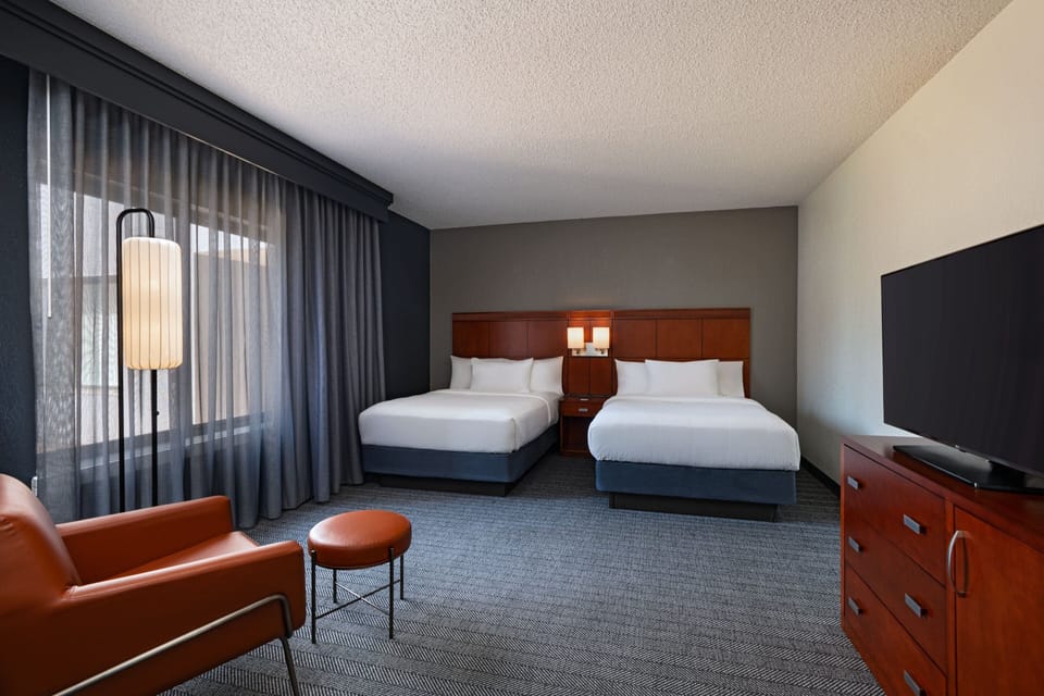 Hypo-allergenic bedding available, in-room safe, desk, laptop workspace