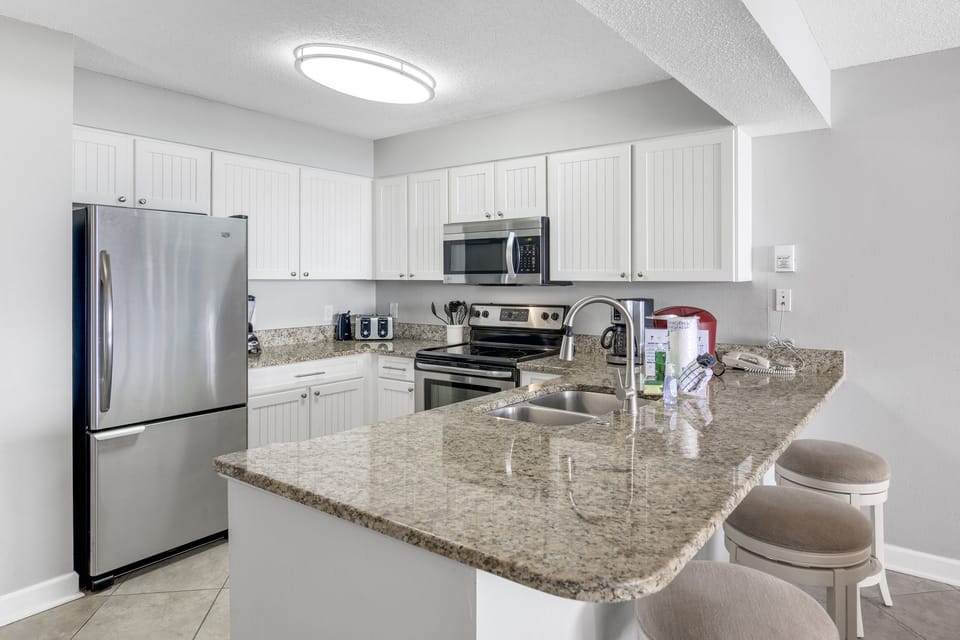 Full kitchen with stainless appliances