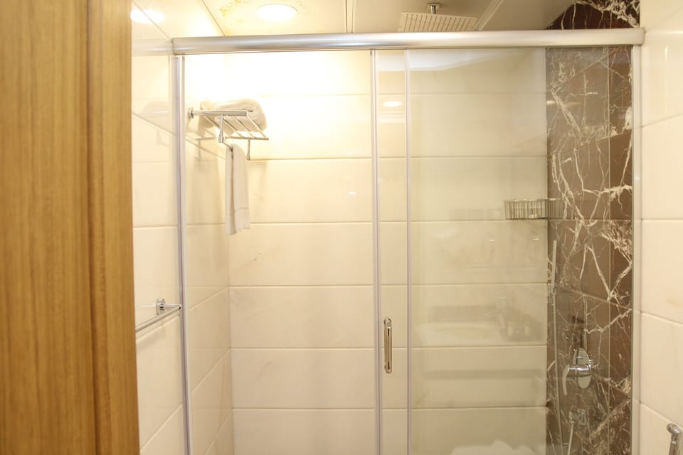 Shower, slippers, towels