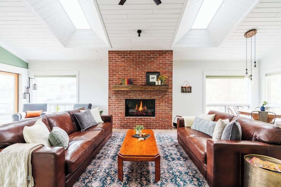 Symmetry is everything. So is a fireplace. Enjoy this incredible living space.