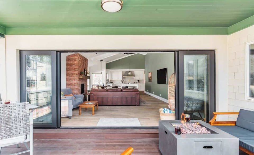 The open concept living area allows you to yell to the person in the kitchen to bring more snacks and drinks outside.