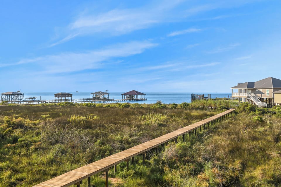 Private boardwalk over the marsh to the bay!