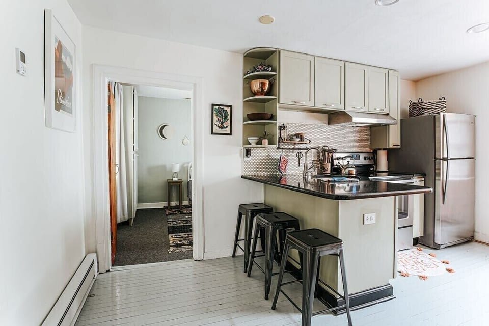 Kitchen with island seating for 3