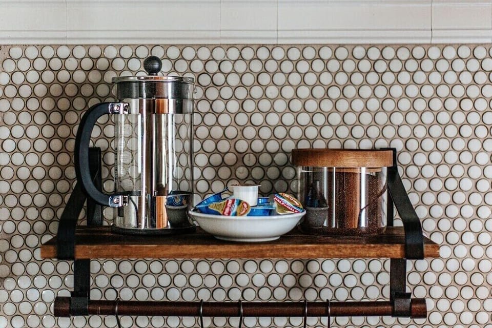 French press, creamers, sugar, and coffee provided!
