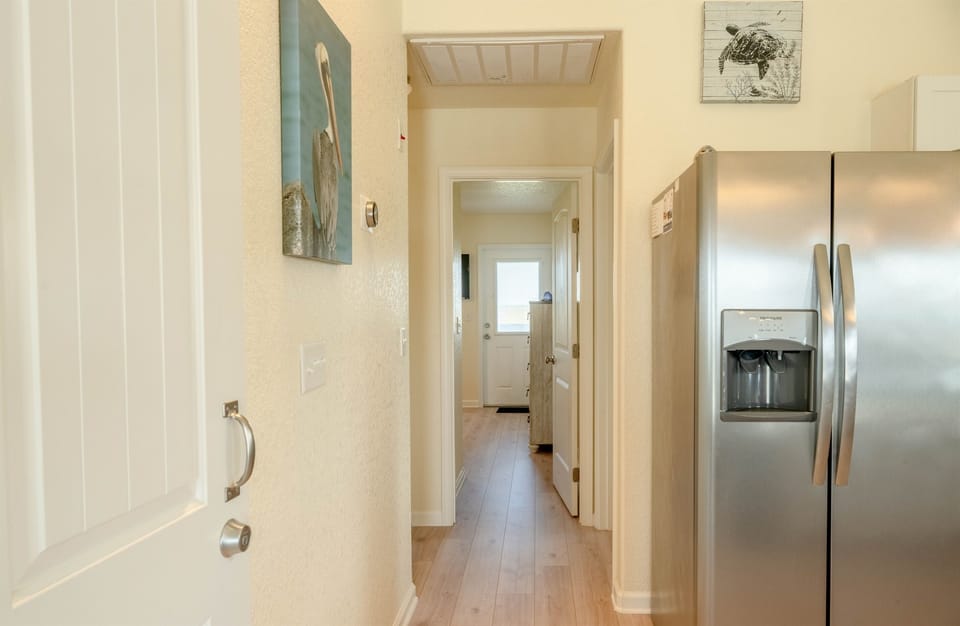 Spacious hallway provides easy access to all 3 bedrooms, bathroom #3 and washer/dryer