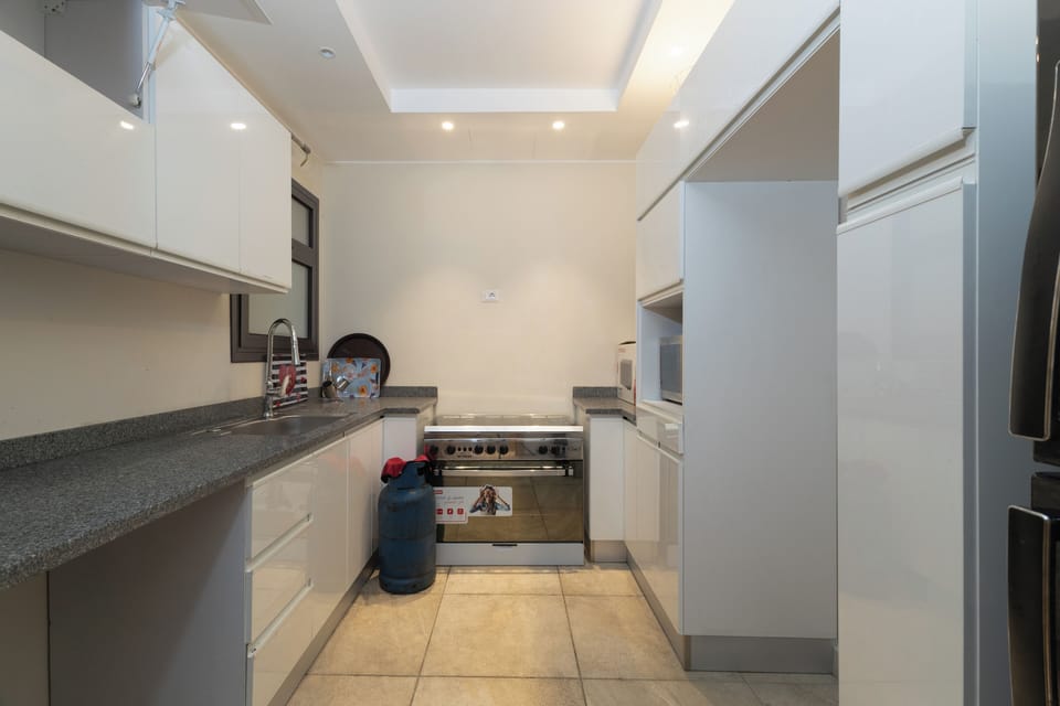 Comfort Apartment | Private kitchen | Full-size fridge