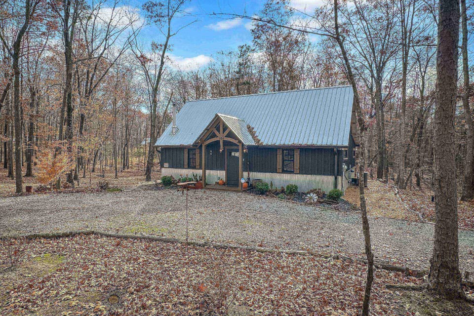 Welcome to Peaceful Hiker's Hideaway on an oversized 1 acre lot