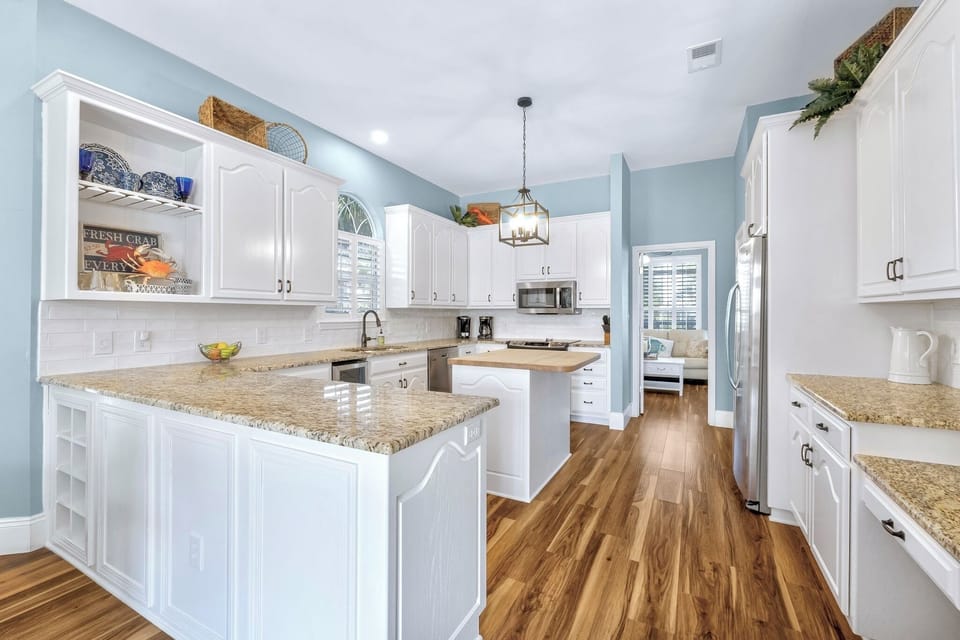 Fully stocked updated kitchen with tons of natural light. 