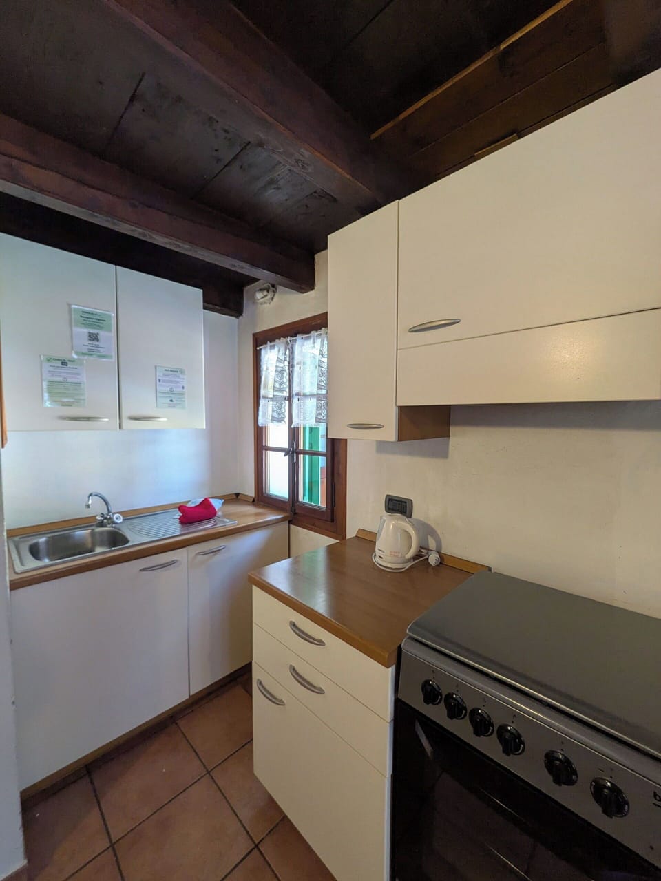 Wood, Cabinetry, Flooring, Kitchen, Kitchen Sink, Countertop, Plumbing Fixture, Floor, Interior Design, Sink