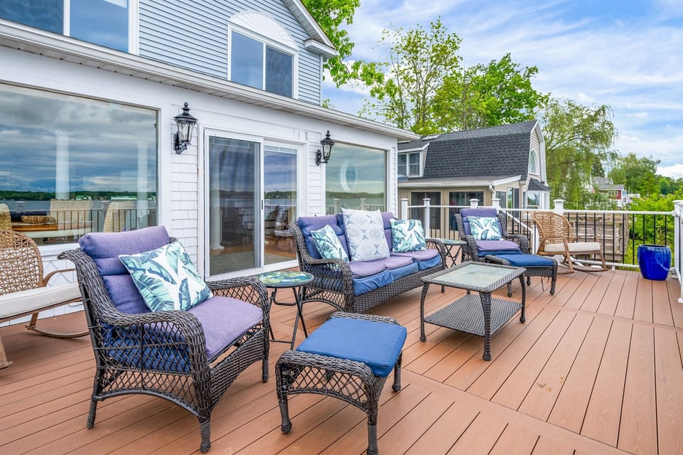 Comfortable outdoor lounge setup overlooking the lake—your perfect gathering spot under the sky.