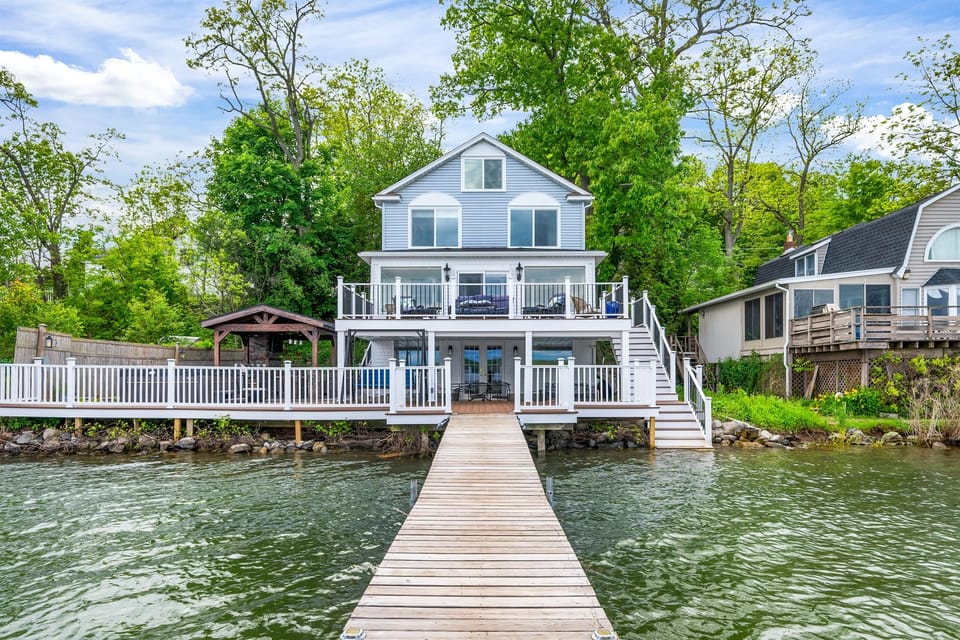 Spacious lakefront home with multi-level decks, perfect for relaxing or entertaining by the water.