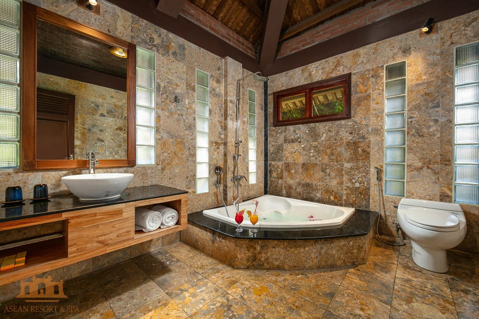 Rainfall showerhead, designer toiletries, hair dryer, bathrobes