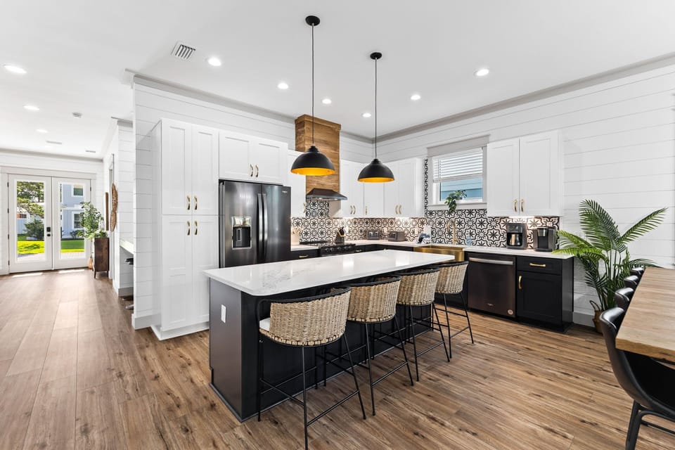 The modern kitchen is a delight for preparing meals.