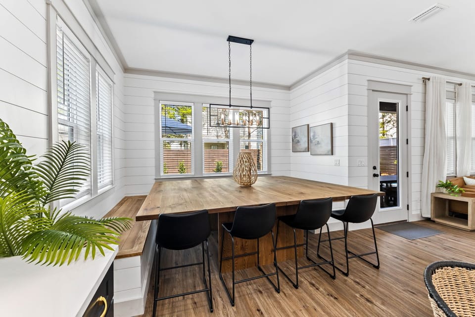 The dining table has custom-built benches.