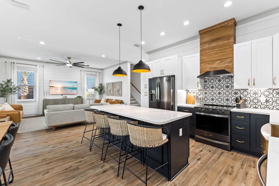 The kitchen island provides additional seating.