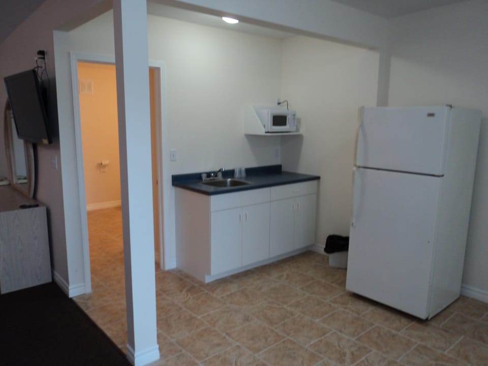 Classic Room, 2 Queen Beds | Private kitchenette | Fridge, microwave