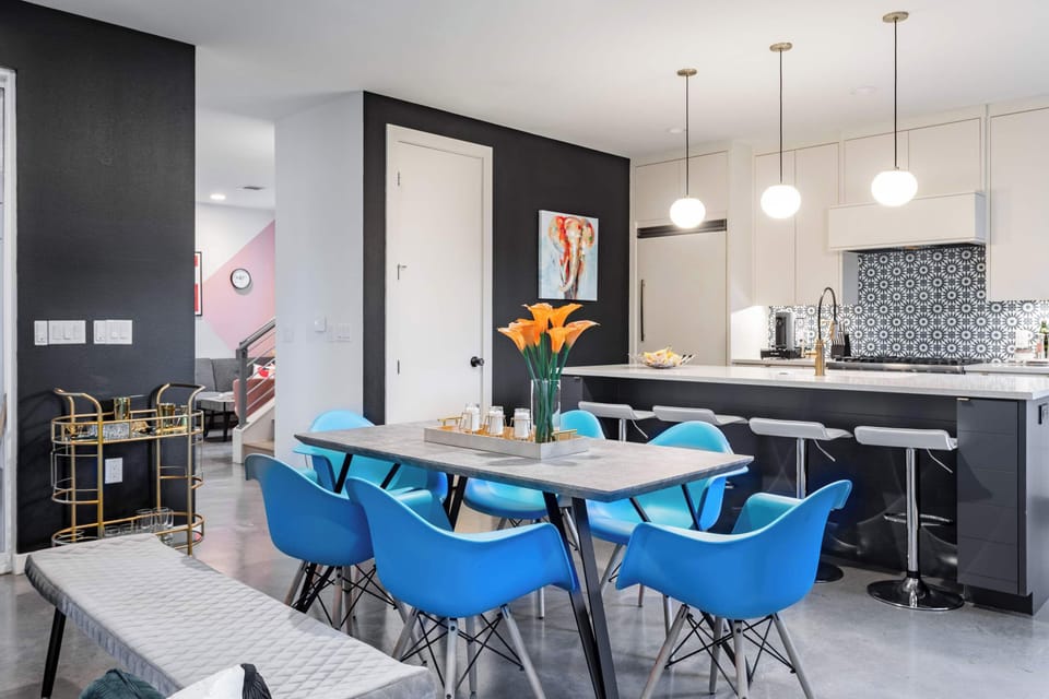 Gather around a dining area for six right beside the kitchen island, where cooking and conversation flow together in one open, social space