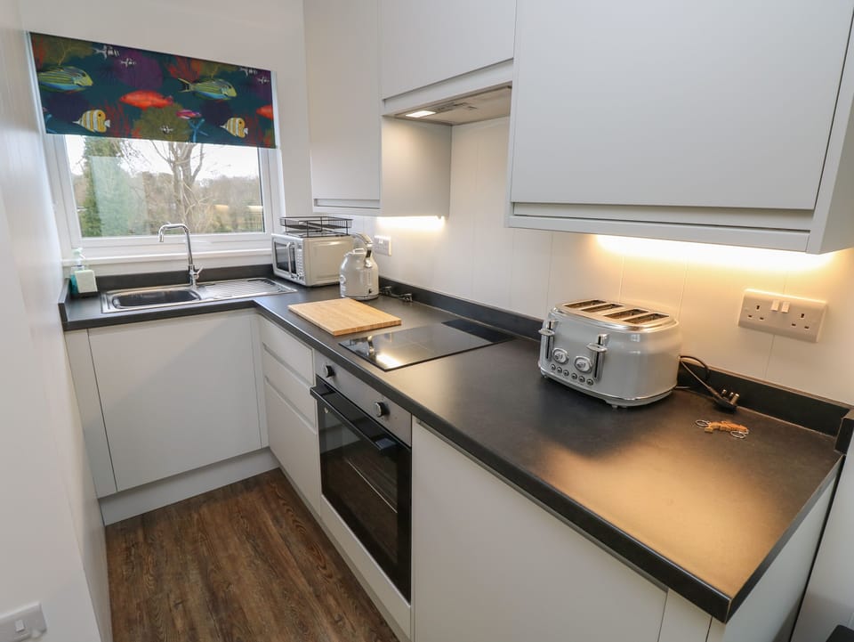 Fridge, electric kettle, toaster, cookware/dishes/utensils