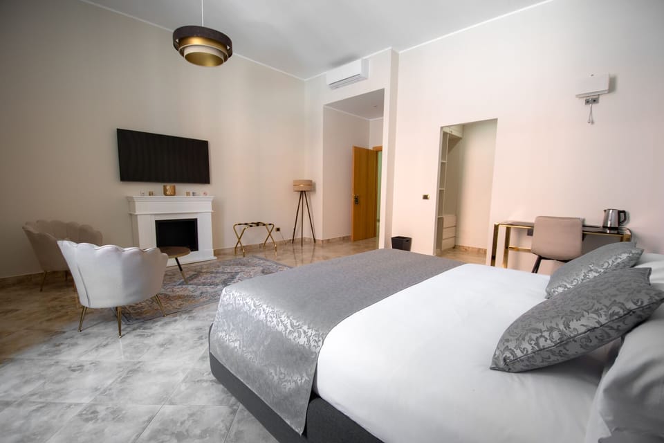 Junior Double Room, 1 Queen Bed with Sofa bed, Ensuite, City View | In-room safe, individually decorated, individually furnished, desk