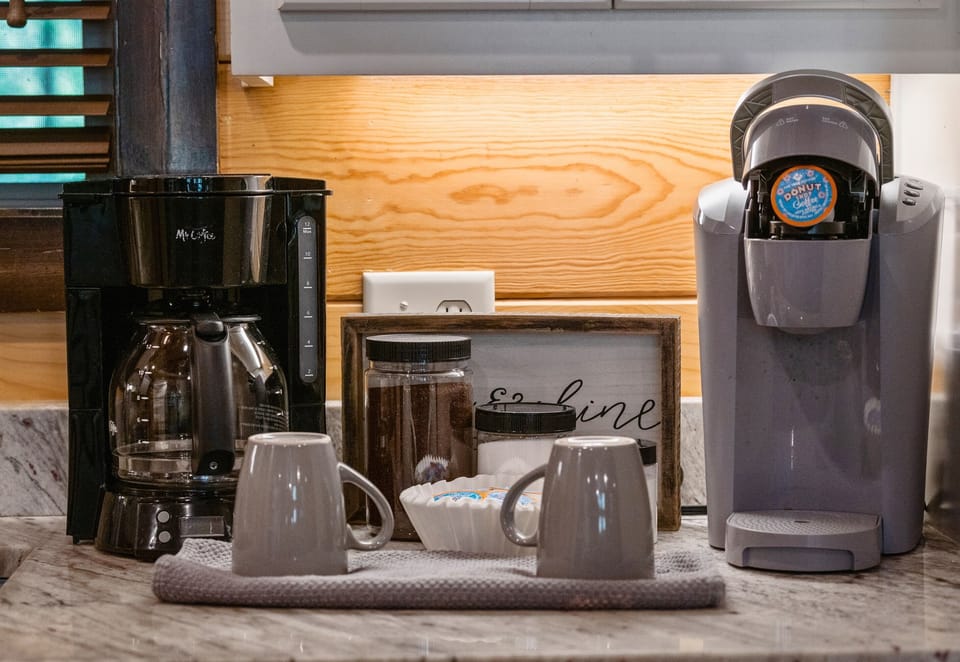 Fresh brews and hearty conversations await in our charming coffee nook, all set for your morning ritual.