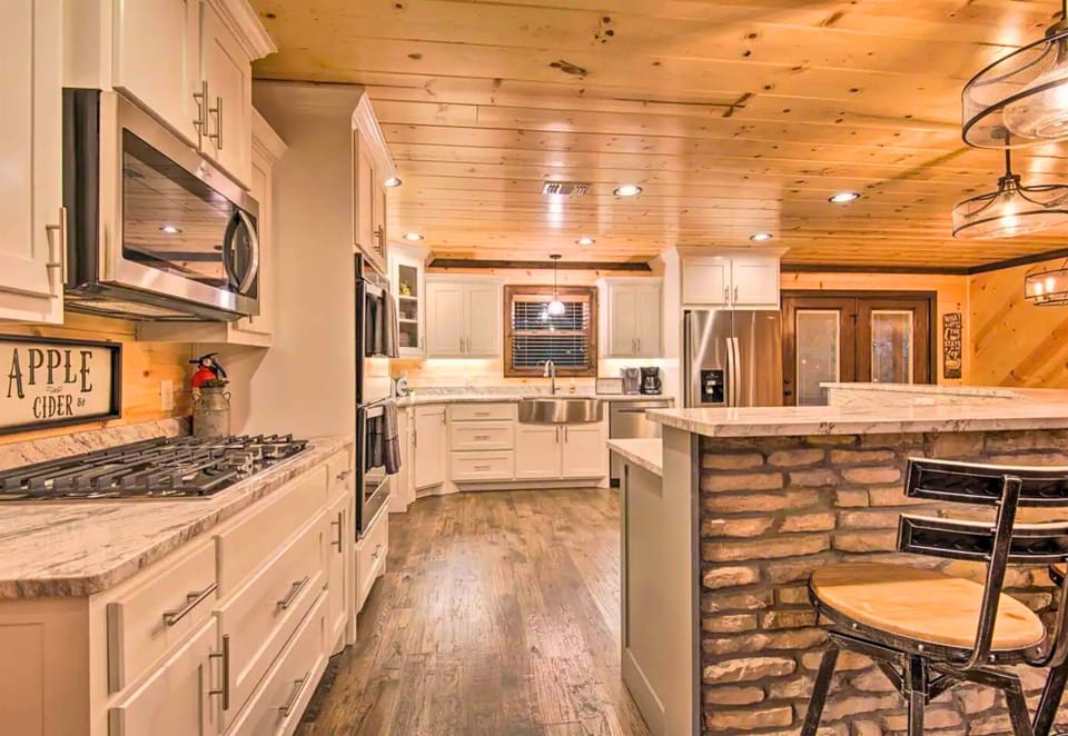 Delight in culinary creativity in our fully-equipped kitchen with breakfast bar seating - where memories and meals are made