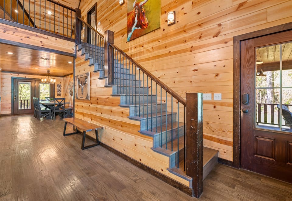 Our cabin’s welcoming entryway: Step into a vacation as warm and inviting as the morning sun