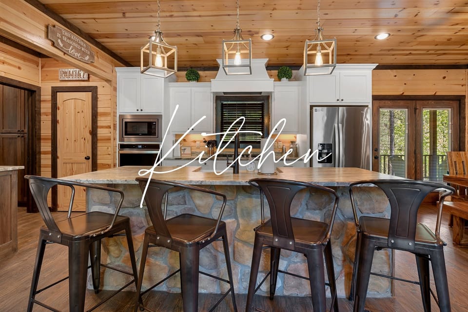 Heart of the Home: Gather, laugh, and create memories in our cabin’s inviting kitchen, where every meal feels like a celebration.