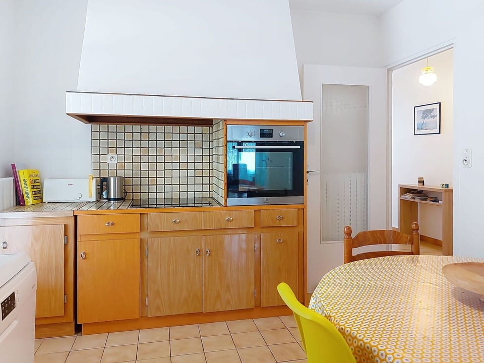 Kitchen, Countertop, Flooring, Interior Design, Wood, Floor, Kitchen Appliance, Major Appliance, Ceiling, Cabinetry