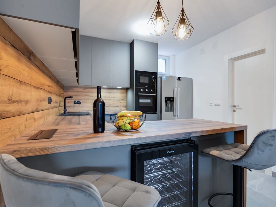 Cabinetry, Countertop, Furniture, Table, Property, Chair, Building, Wood, Kitchen, Lighting