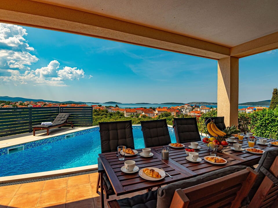 Sky, Table, Cloud, Furniture, Tableware, Water, Azure, Interior Design, Outdoor Furniture, Lighting