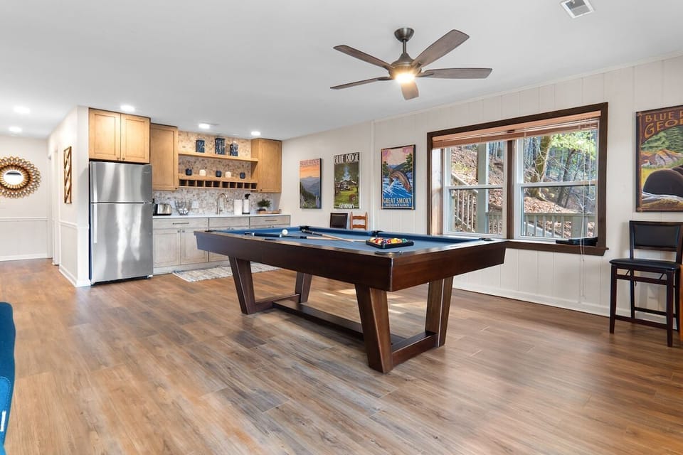Enjoy a game of pool while surrounded by views of the outdoors!