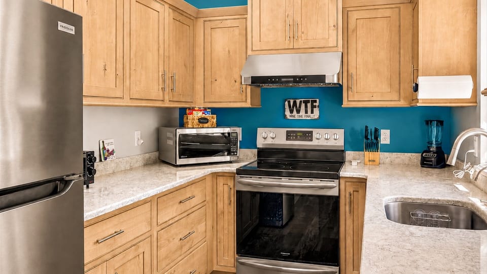 Full-size fridge, range, microwave, toaster oven so you can cook a real meal.