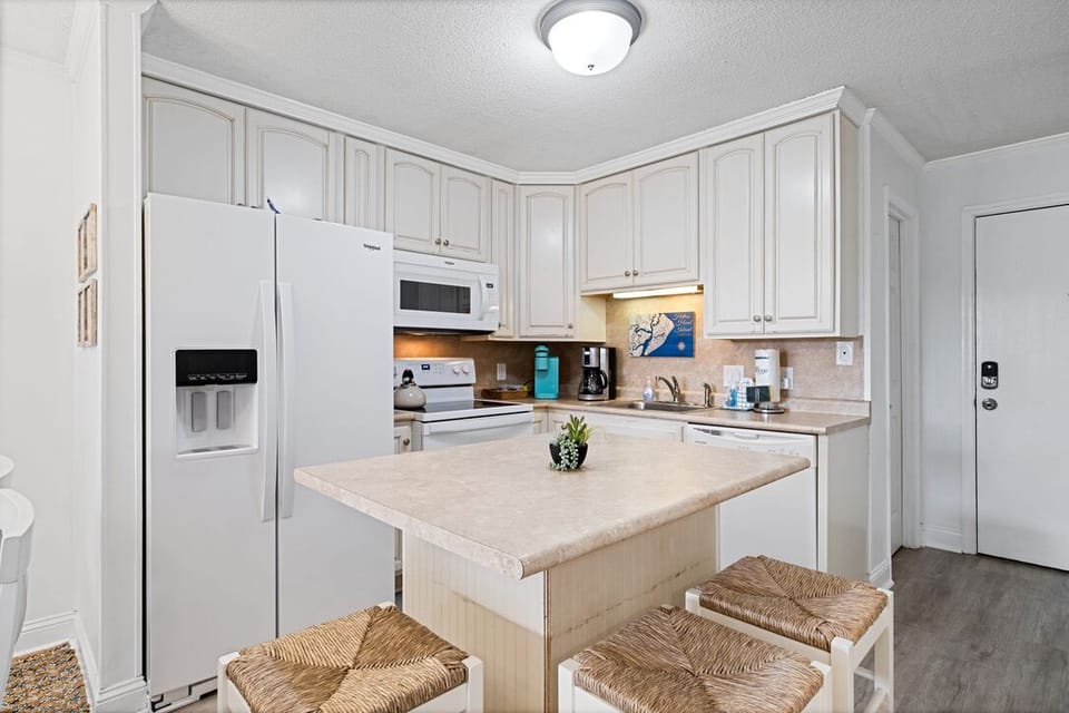 Chat, snack, or prep at this spacious kitchen island