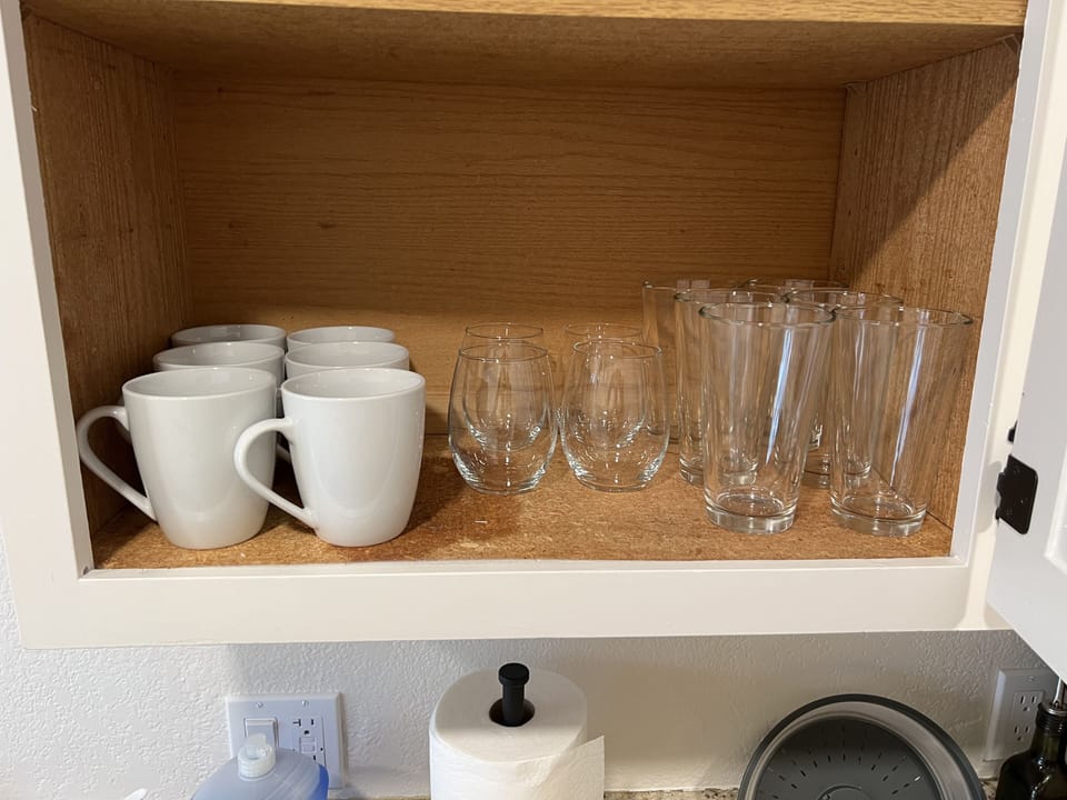Mugs and glasses in the kitchen area