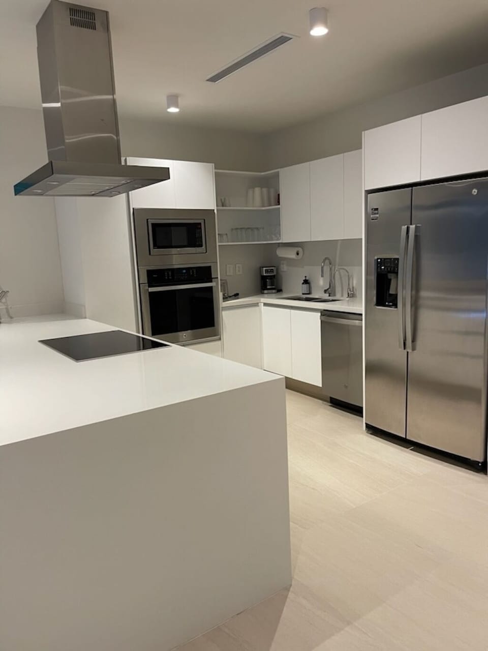 Full kitchen - fridge, stove, oven, microwave, dishwasher, dishes, and utensils