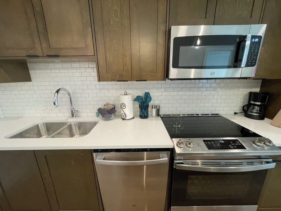 Fully Stocked Kitchen, plus Salt/Pepper, Cooking oil, Ground Coffee and tea.