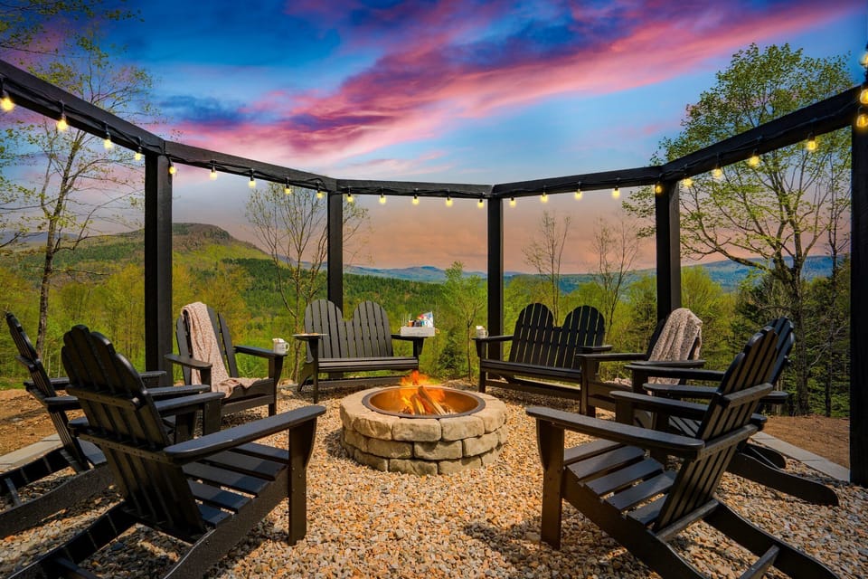 Unwind at our stunning fire pit area and enjoy the majestic mountain views. The fire's glow and the illuminated landscape at night provide a captivating backdrop, perfect for creating lasting