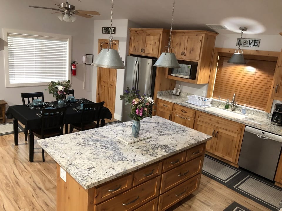 Kitchen w/Island Bar/ Dining area
