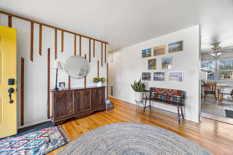 Living area connects you to the kitchen and hallway that leads to bedrooms.