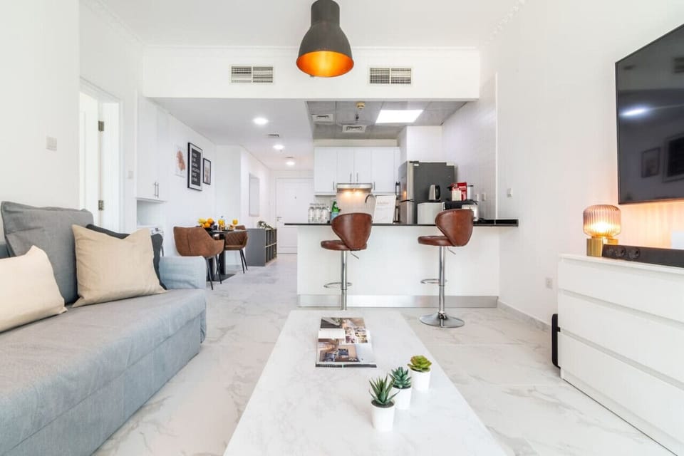 Living Room: Stylish space with modern decor, perfect for relaxation or entertaining friends!