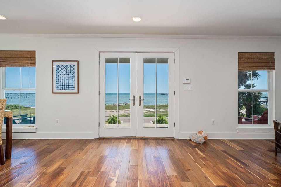 grand front entrance with unobstructed water views