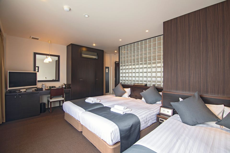 City Quadruple Room | Blackout drapes, free WiFi, bed sheets
