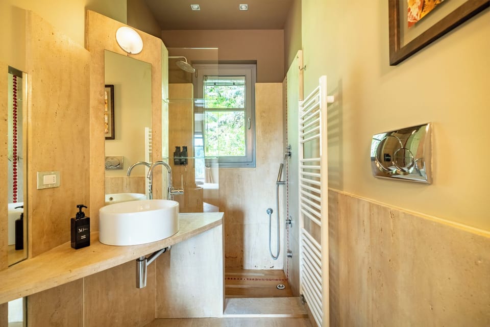 Luxury Double Room, Pool View | Bathroom | Shower, hair dryer, bidet, towels