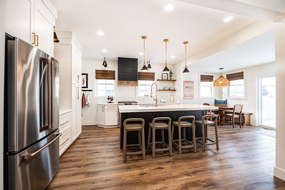 Amazing NEW kitchen. Quartz counters, GE Cafe Appliances, Dining Baguette. 