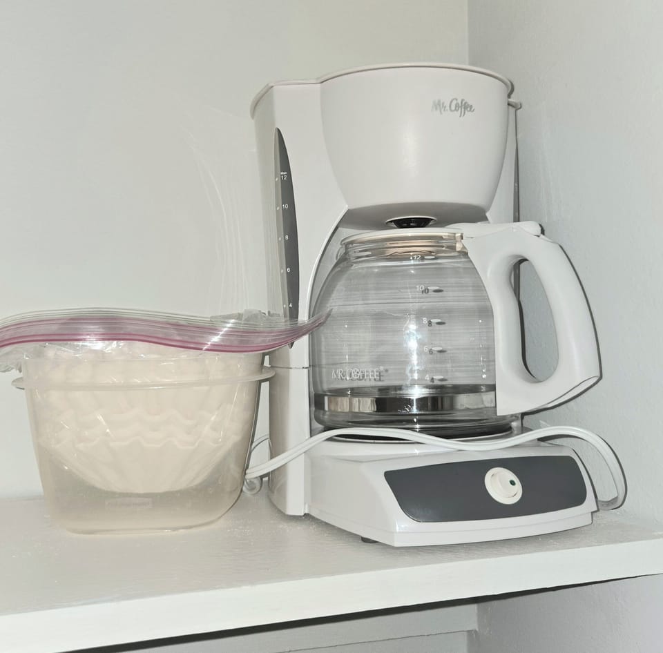Full size coffee pot and filters as well as Keurig single cup 