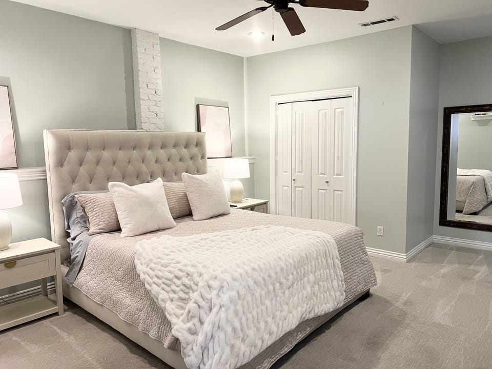 Comfortable King size bed with a desk and a TV in the room!