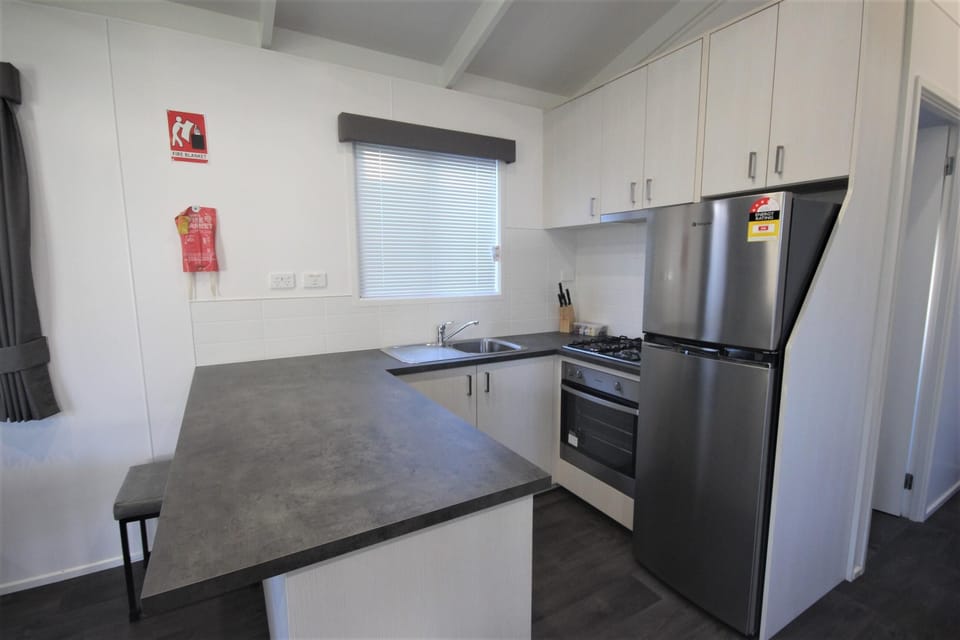 Poolside Villa | Private kitchen | Fridge, microwave, coffee/tea maker, electric kettle