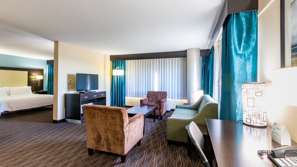 Premium bedding, pillowtop beds, desk, laptop workspace