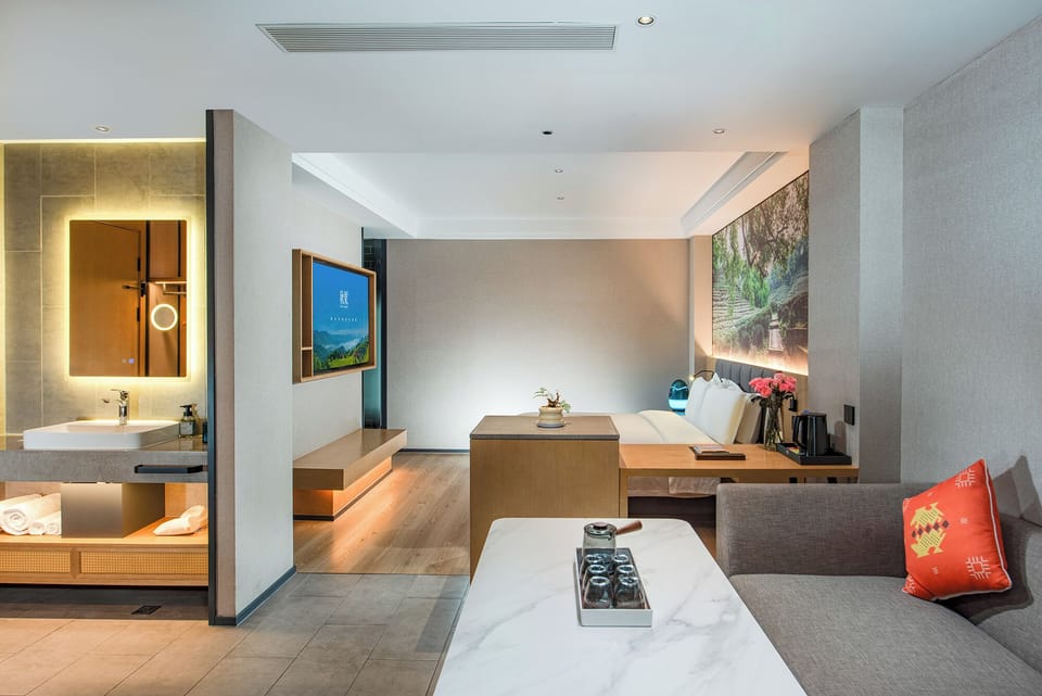 Premium Studio Suite, 1 King Bed, City View | Premium bedding, down comforters, pillowtop beds, minibar