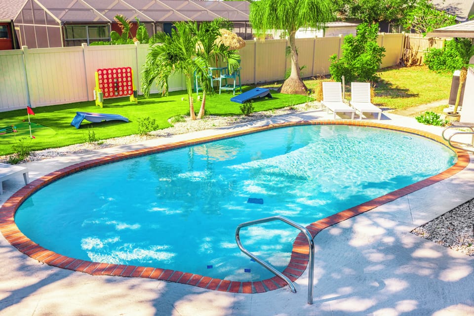 Pool, games, and putting green